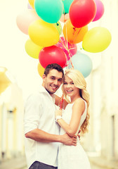 Canvas Print - couple with colorful balloons