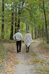 Canvas Print - Elderly couple in forest