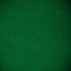 green fabric textile material as texture or background