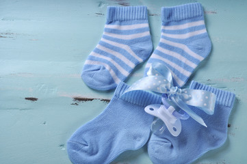 Wall Mural - Baby boy nursery blue and white socks with copy space