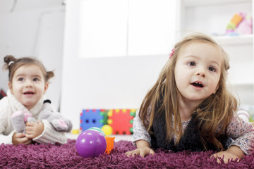 Canvas Print - Girls playing in the room