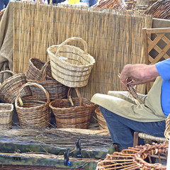 craftsman working to manufacture wicker basket