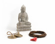Buddha with Prayer Beads and Meditation Bells.