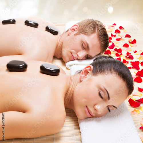 Obraz w ramie Attractive couple relaxing in spa salon.