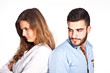 © closeupimages - Young mixed-race couple having ralationship problems isolated on