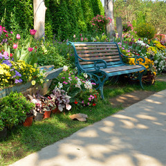 Wall Mural - vintage bench in flowers spring summer garden