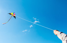 Kite Flying In A Beautiful Sky Clouds