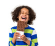 Little girl eating chocolate