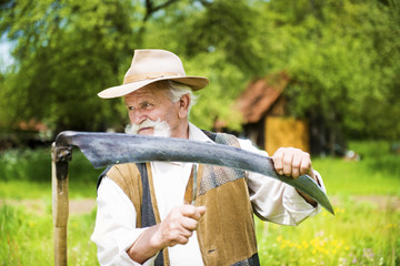 Wall Mural - Man with scythe