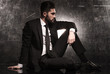 © Viorel Sima - side of an elegant business man in black suit