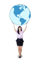 Businesswoman is holding world globe 2