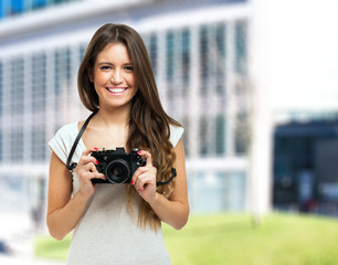 Young smiling photographer