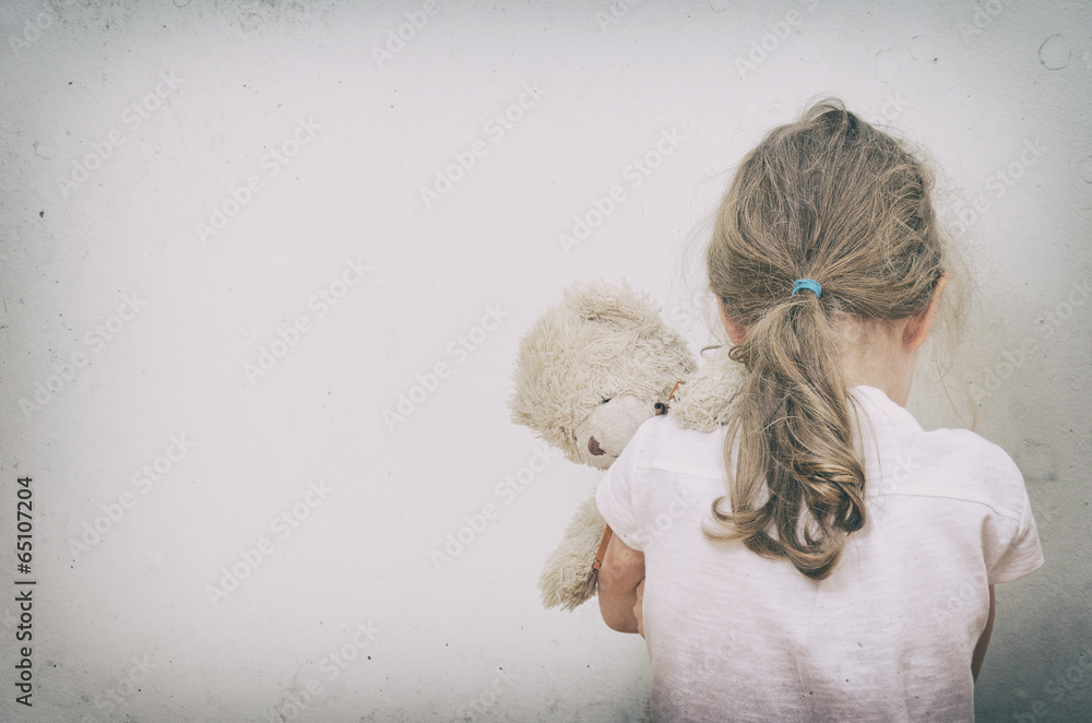 Little girl crying in the corner. Domestic violence concept. - obrazy, fototapety, plakaty 