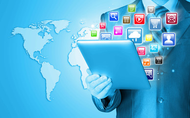 Business man use tablet pc with colorful application icons