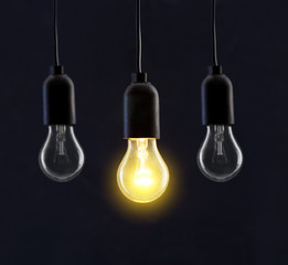 Light bulb lamps on black background