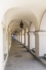 Arcade ancient house in the central square