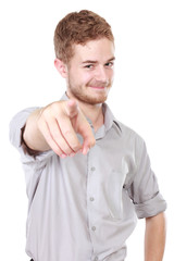 Businessman pointing his finger at you