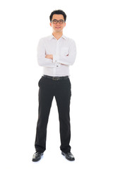 Wall Mural - Young Asian business man isolated on white background.