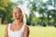 © adam121 - attractive woman of exercises on the grass
