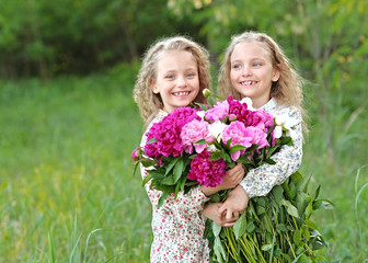 Wall Mural - Portrait of two little girls twins