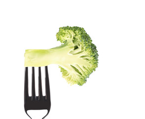 Wall Mural - Fresh broccoli on a fork.