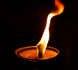 Thai style candle cup in thai temple at night 