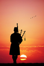 Pipers At Sunset