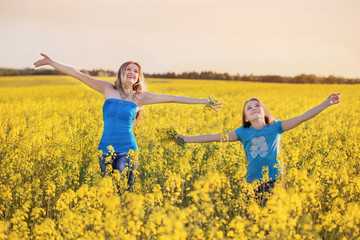 Happy family in spring field