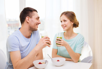 Sticker - smiling couple having breakfast at home