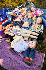 Wall Mural - Portrait of young children on a camping holiday