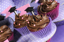 Graduation Day Pink And Purple Party Cupcakes - Angle Close Up.