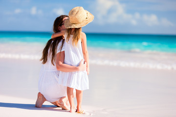 Wall Mural - Mother and daughter at beach