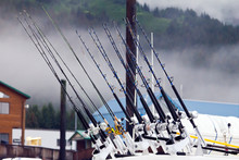 Fishing Poles Lined Up On A Boat In Alaska