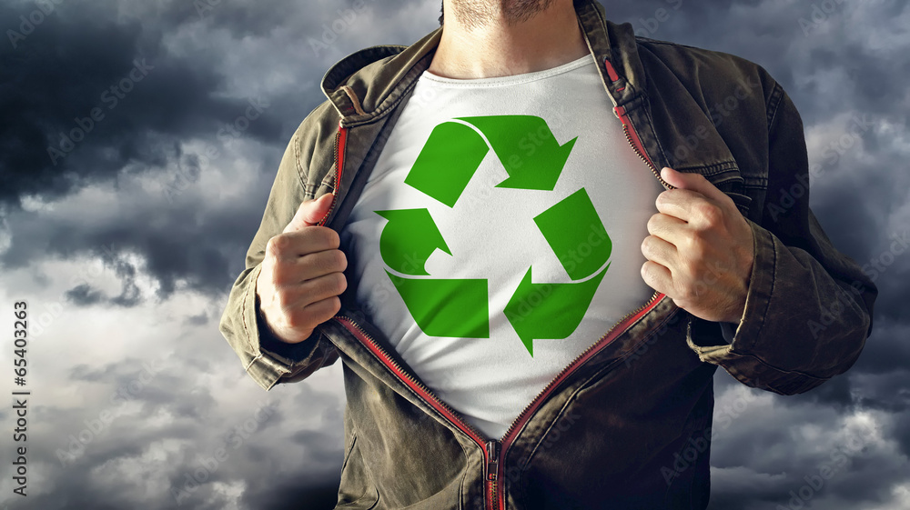 Man stretching jacket to reveal shirt with recycle symbol printe - obrazy, fototapety, plakaty 