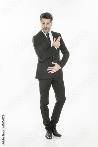 Fotografia, Obraz portrait of an expressive young man in suit on isolated backgrou