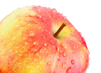 Red apple close-up with drops of water isolated on white backgro