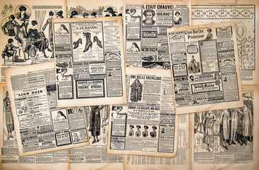 newspaper pages with antique advertising