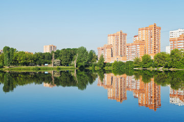 Wall Mural - city ​​pond with houses along the waterfront