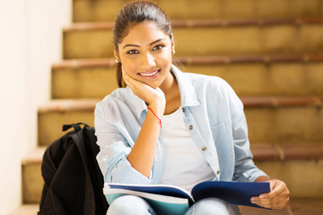 Wall Mural - indian college girl sitting on stairs