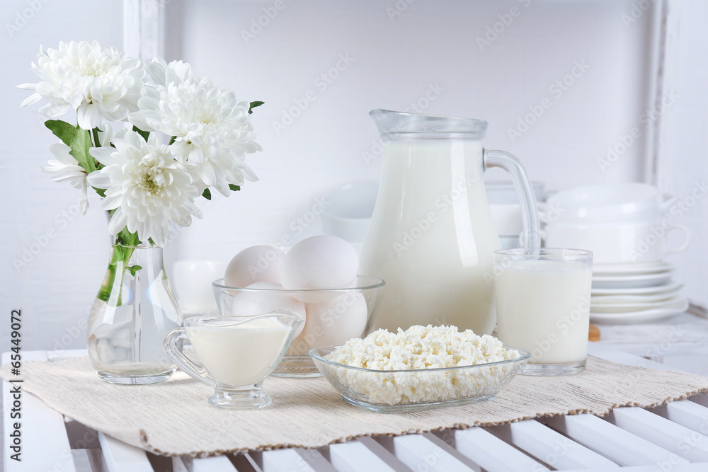 Still life with tasty dairy products on table