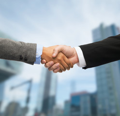 Poster - businessman and businesswoman shaking hands