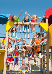 Wall Mural - Happy kids playing outdoors