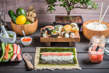 Wall Mural - Table with ingredients for sushi