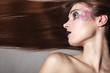 © Voyagerix - Portrait of woman with long straight hair and creative makeup