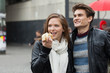 Couple With Hot Dog Looking Away