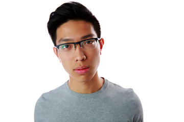 Sticker - Portrait of a young pensive asian man over white background