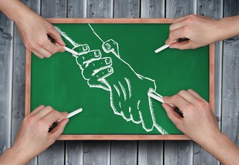 Poster - Composite image of multiple hands drawing handshake with chalk
