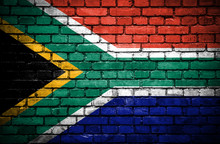 Brick Wall With Painted Flag Of South Africa
