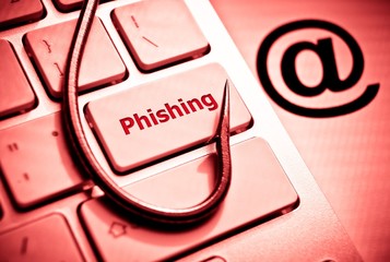 Wall Mural - phishing / fish hook on computer keyboard