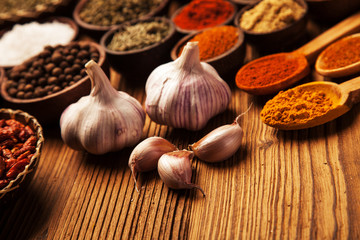 Canvas Print - Spices and herbs in wooden bowls.